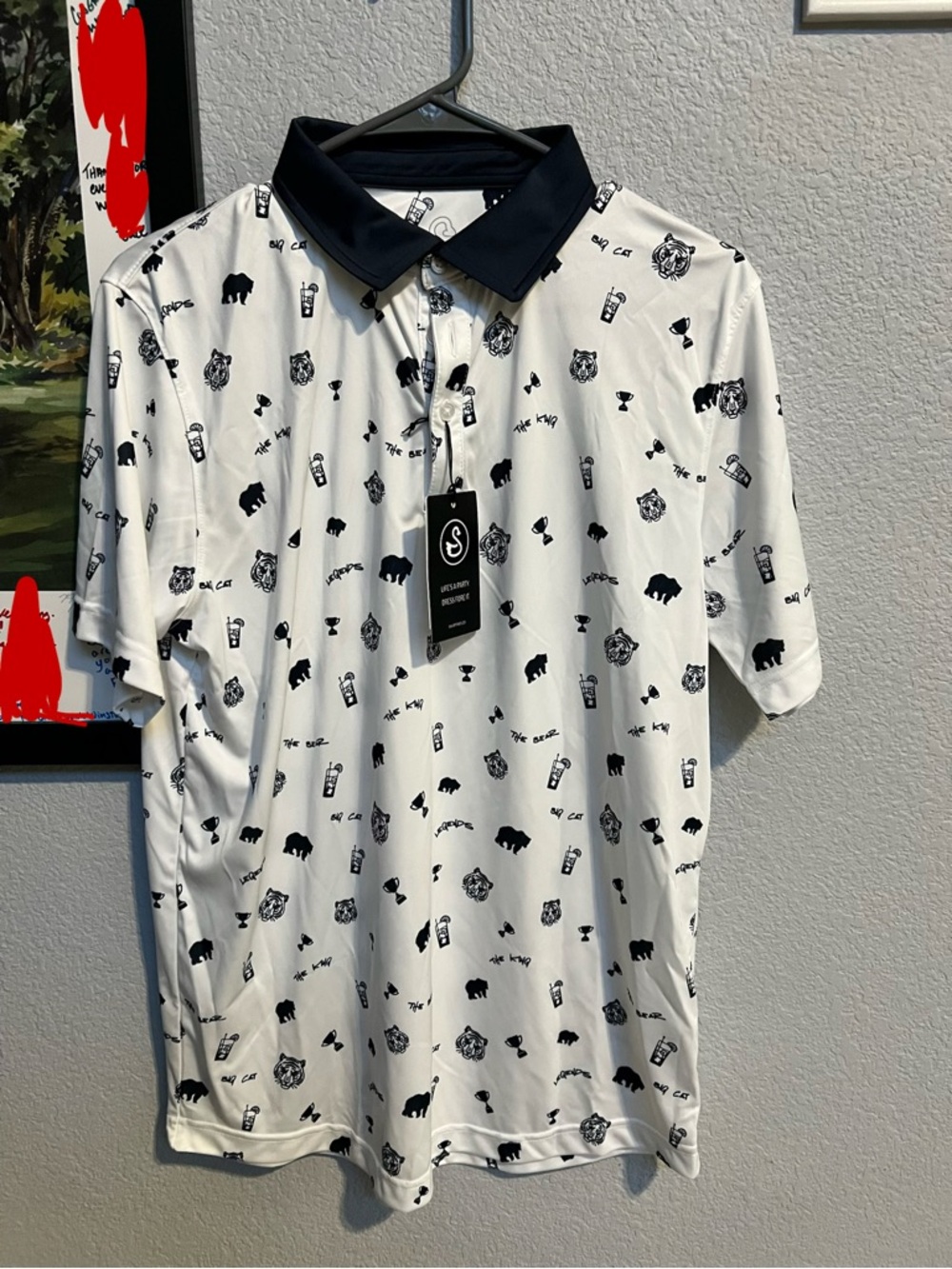 Swannies big cat golf polo